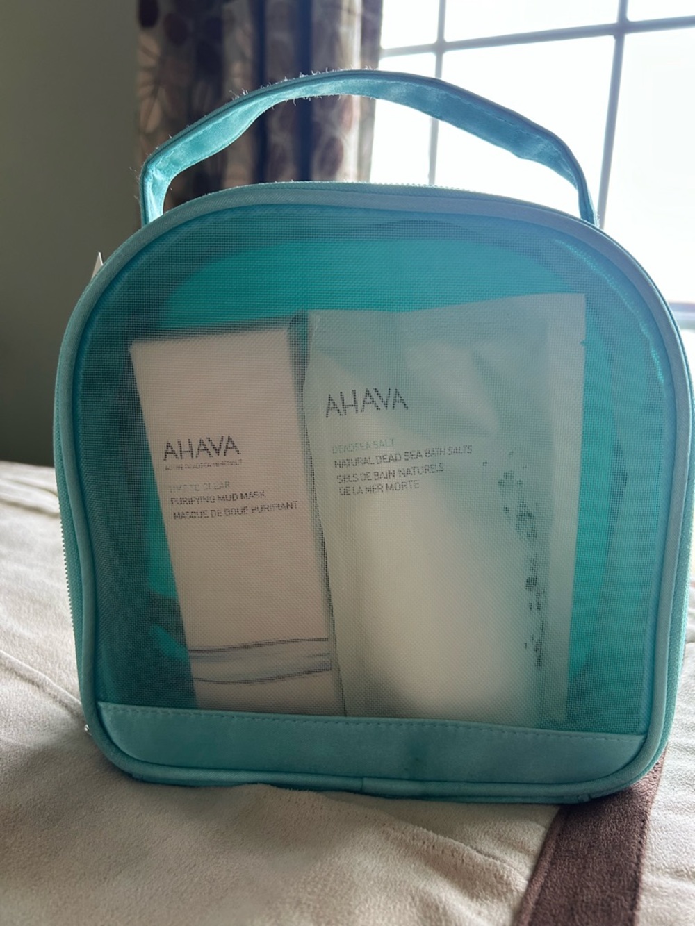 AHAVA Teal Mesh Travel Pouch with Skincare Set.  Great Products‼️